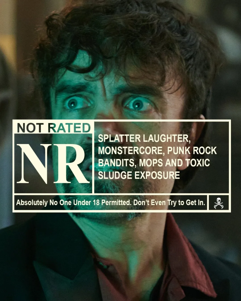 The Toxic Avenger official rating stamp as unrated image with Peter Dinkelage.